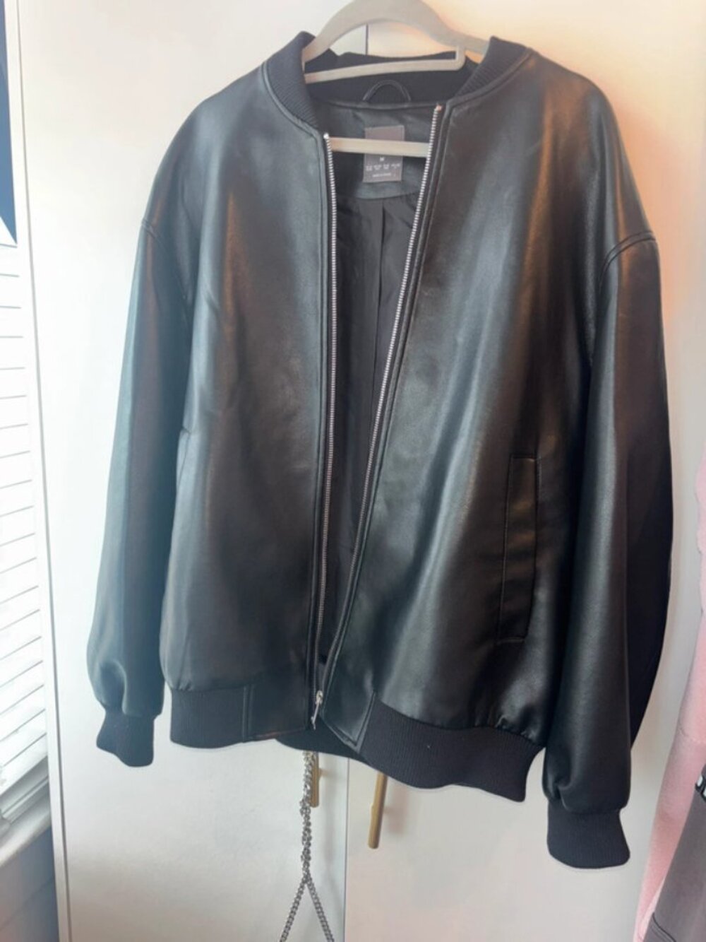 Black leather bomber jacket